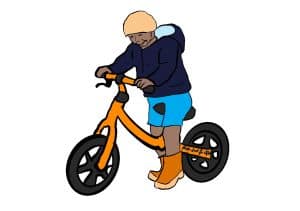 An illustration of a child riding an orange balance bike