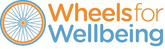 Wheels for Wellbeing logo. A blue and orange cycle wheel with spokes next to the words “Wheels for Wellbeing”. “Wheels for” is orange, “Wellbeing” is blue.